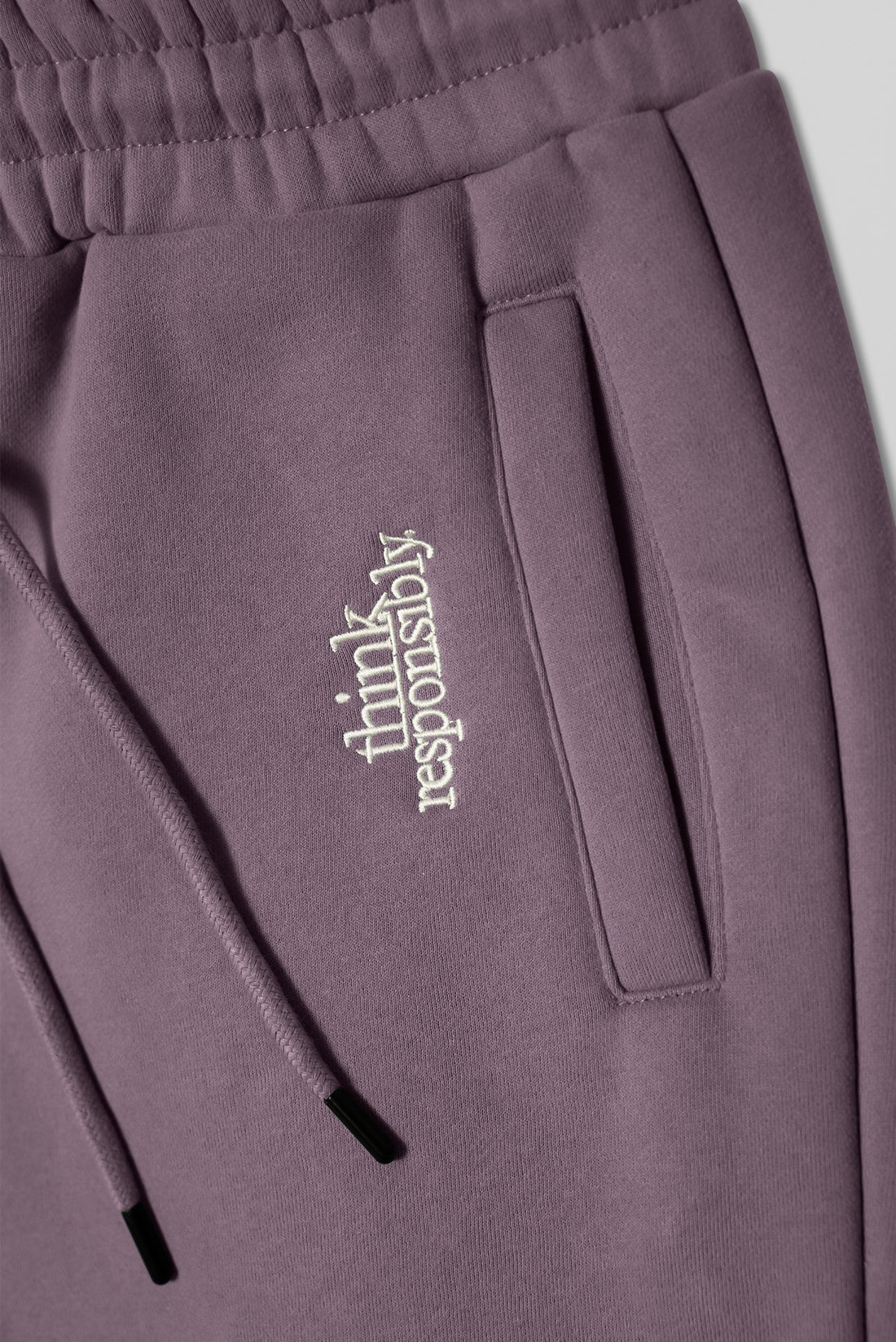 
                  
                    Think Responsibly Sweatsuit Soot Purple
                  
                